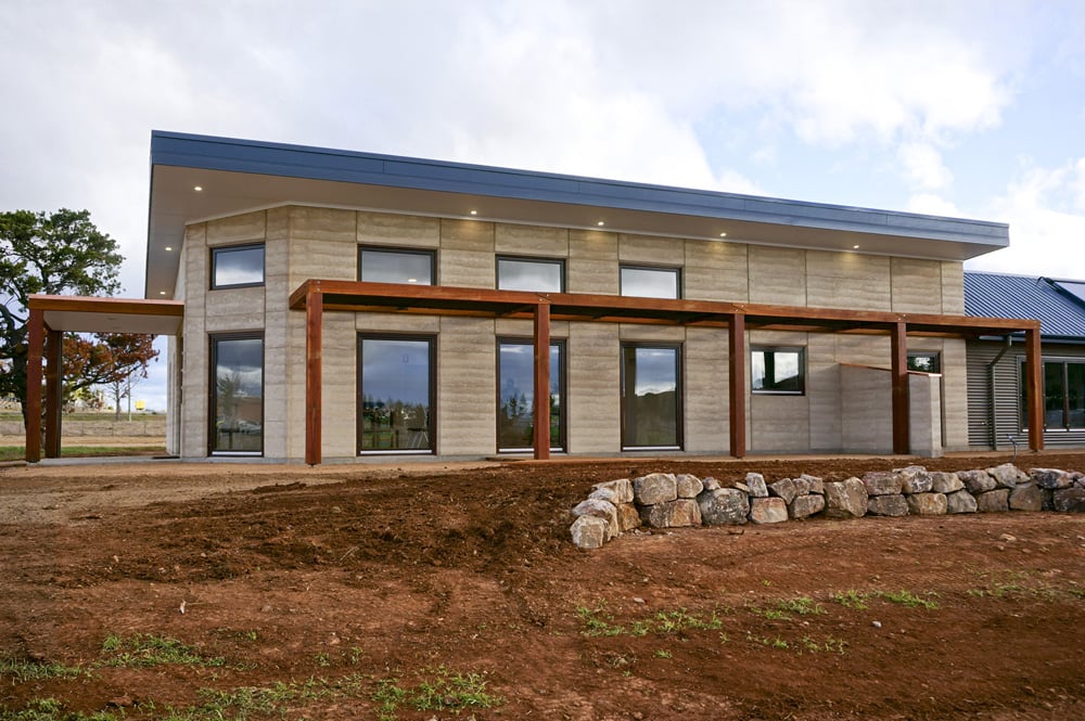 Rammed Earth building with eco windows. Vet hospital by Architecture Republic, Bowral
