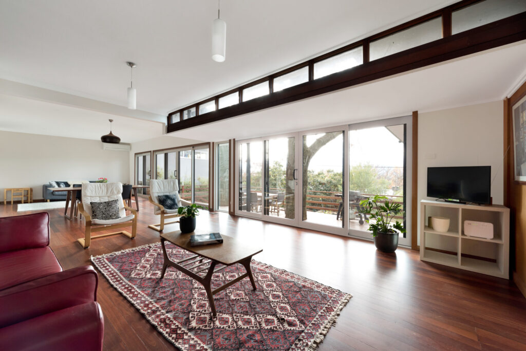 Mid-century modern open-plan living space, renovated by Architecture Republic in Canberra