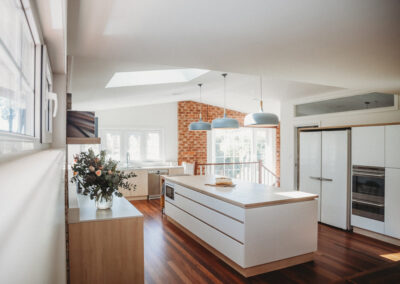 Whole renovated space of the Canberra kitchen extension showing natural light and lots of storage.