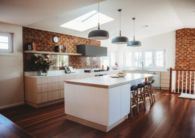 Renovated canberra kitchen showing the light-filled space compared to fairly dark existing space.