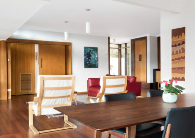 Living and dining room of a midcentury house.