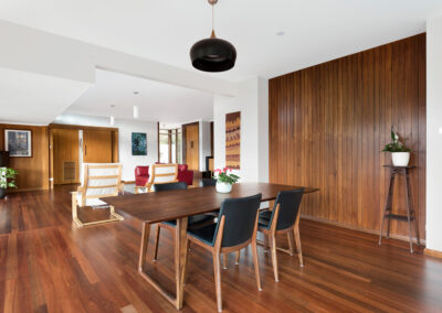Dining room in midcentury extension project. The living space is in the background